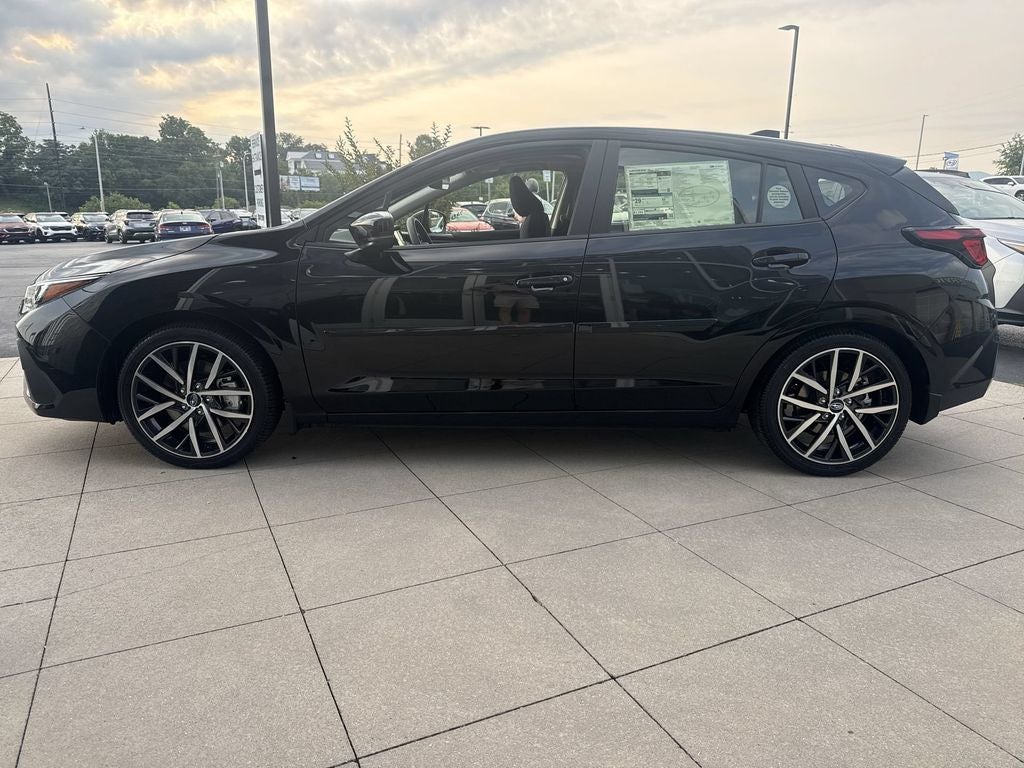 2026 Subaru IMPREZA Sport in Crystal Black Silica — front three-quarter view