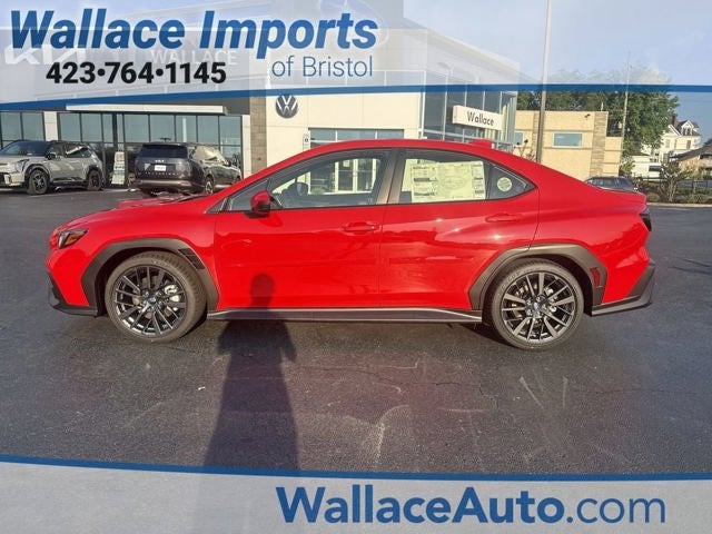 2026 Subaru WRX Base in Ignition Red — front three-quarter view