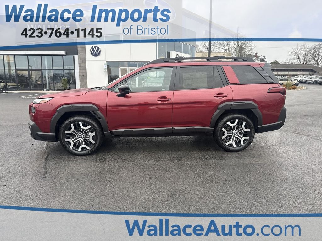 2026 Subaru OUTBACK Touring XT in Crimson Red Pearl — front three-quarter view