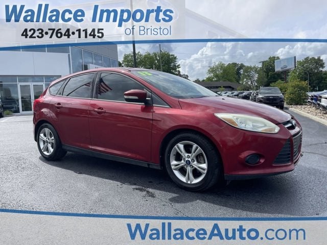 2013 Ford Focus SE in Ruby Red Metallic — front three-quarter view