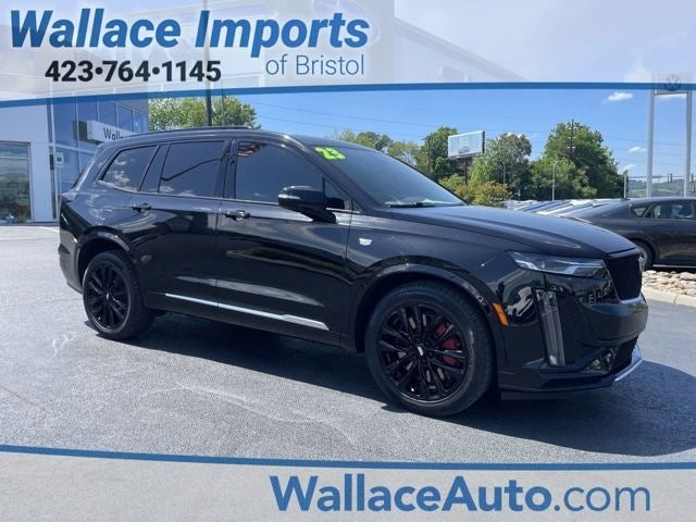 2023 Cadillac XT6 Sport in Stellar Black Metallic — front three-quarter view