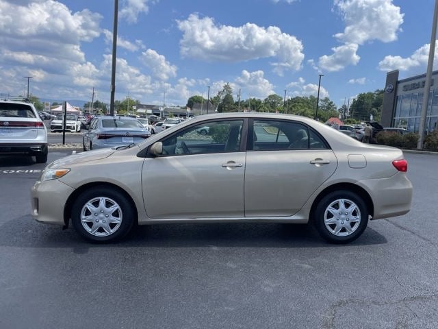 2011 Toyota Corolla — rear three-quarter view