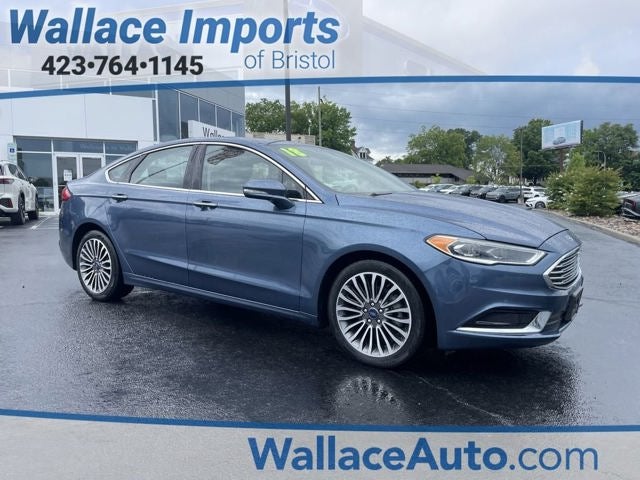 2018 Ford Fusion SE in Blue Metallic — front three-quarter view