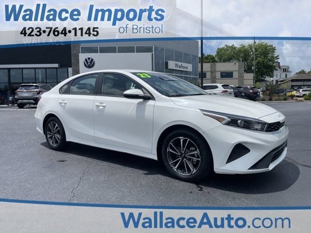 2023 Kia Forte LXS in Snow White Pearl — front three-quarter view