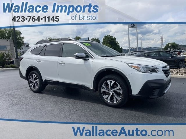 2020 Subaru Outback Touring in Crystal White Pearl — front three-quarter view