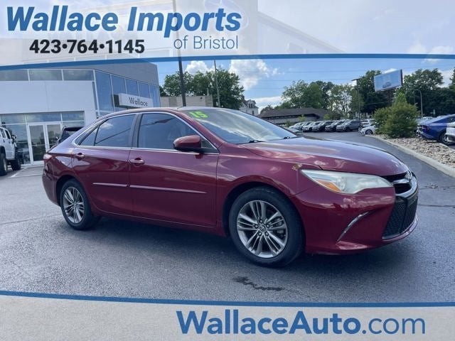 2015 Toyota Camry SE in Red — front three-quarter view
