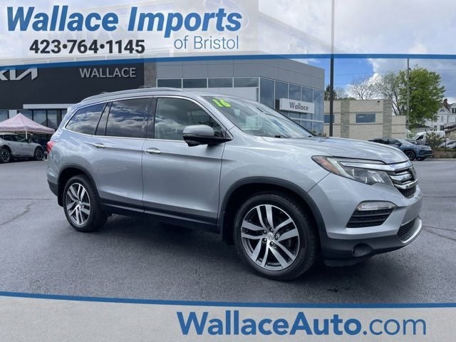 2016 Honda Pilot Touring in Lunar Silver Metallic — front three-quarter view
