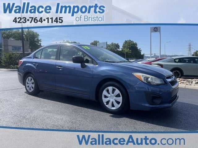 2013 Subaru Impreza 2.0i in Marine Blue Pearl — front three-quarter view